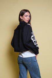 CHAQUETA DRIL FLORES EN CINTAS NEGRA