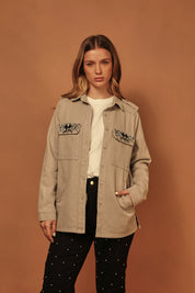 CHAQUETA DENIM GRIS RHINESTONE EN BOLSILLO